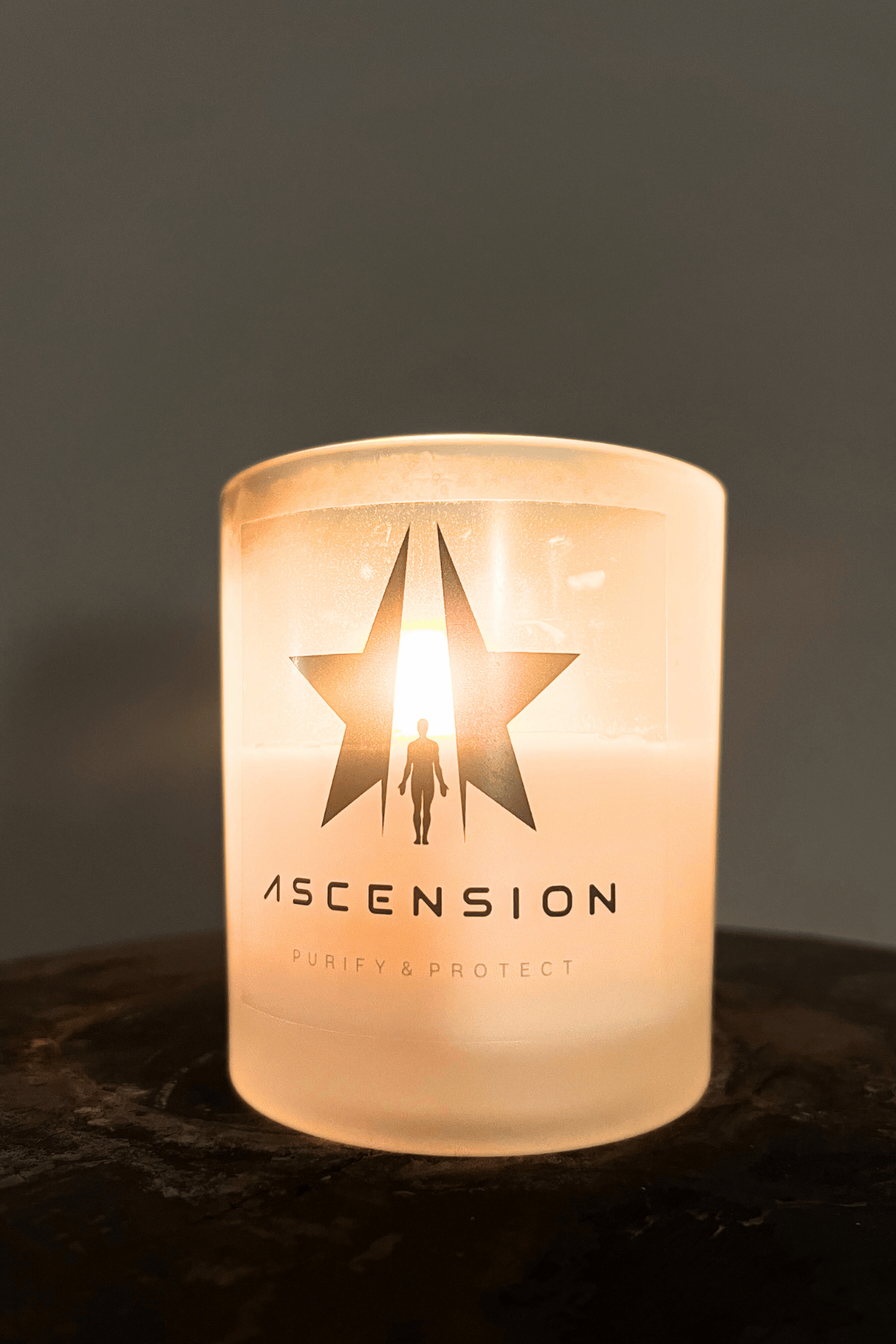 A Galactic Federation of Light ASCENSION Candle in a glass jar, exuding an ambiance of calmness, with the word 