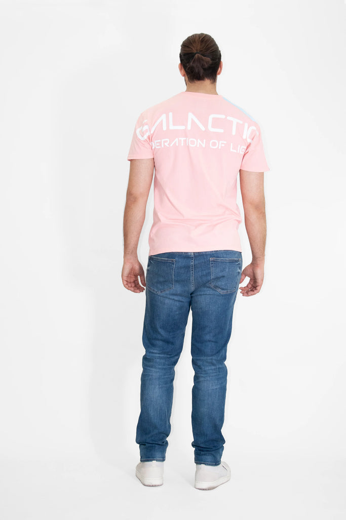 The back of a man wearing a GFL STARS TEE IN SUNFADE by GFLApparel and jeans.