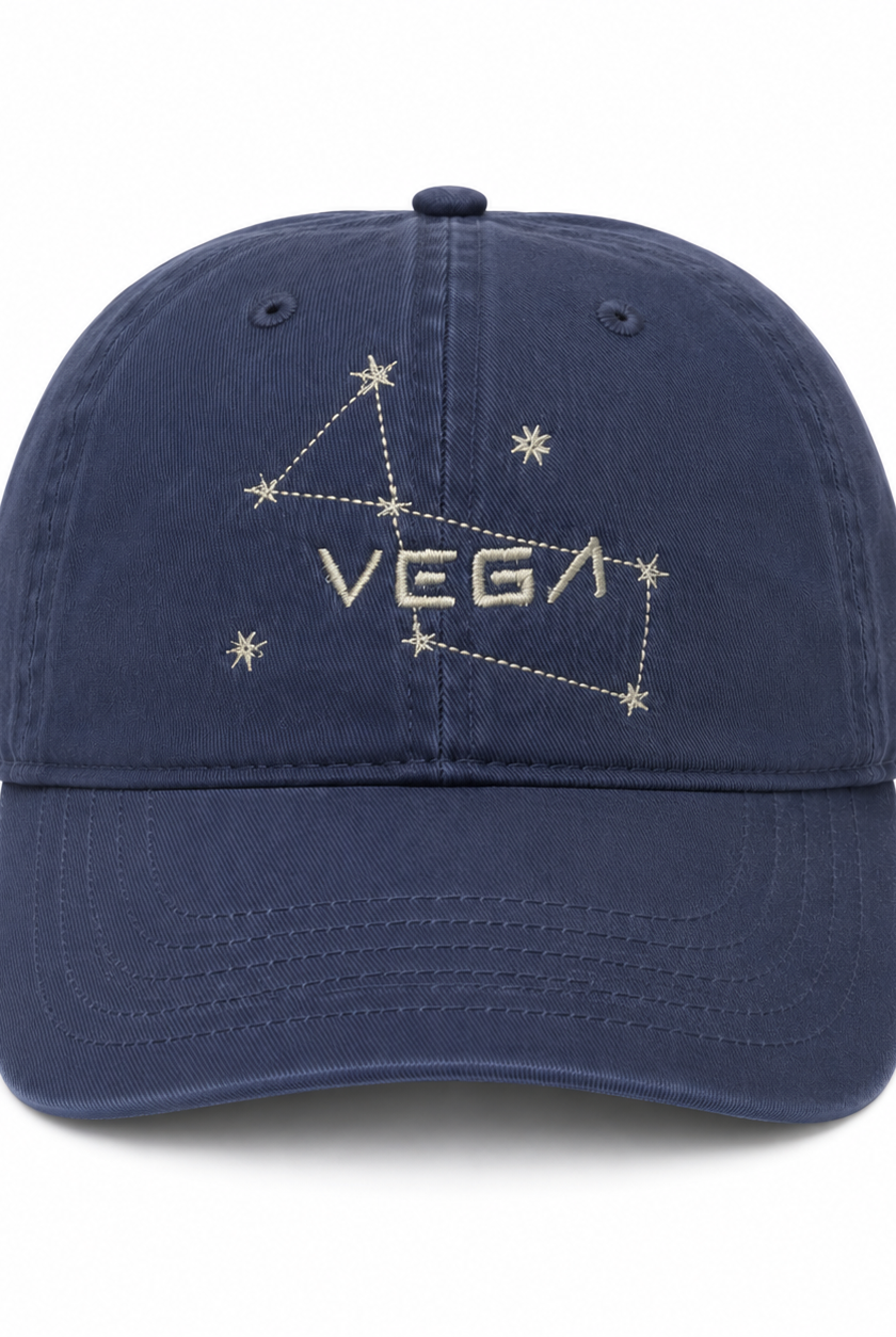 Vintage navy Vega Starseed baseball cap featuring the Lyra constellation embroidered in silver metallic thread.
