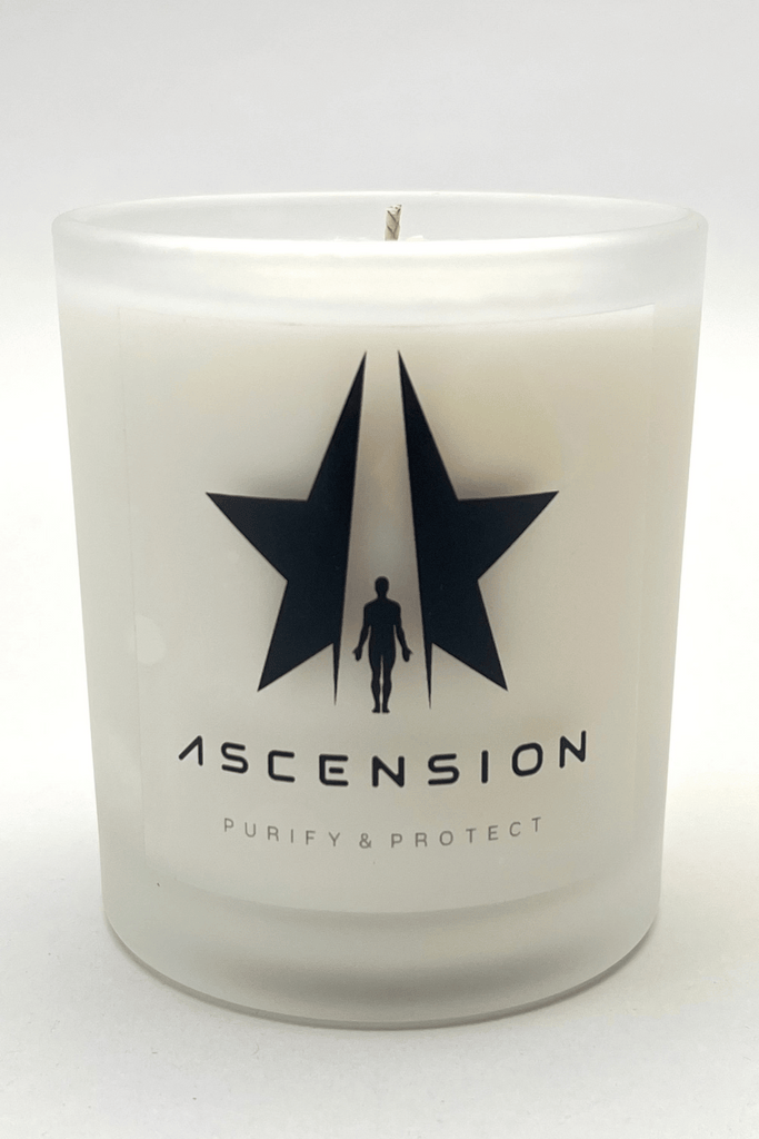 A soy wax scented candle labeled "Galactic Federation of Light" with a star and silhouette motif.