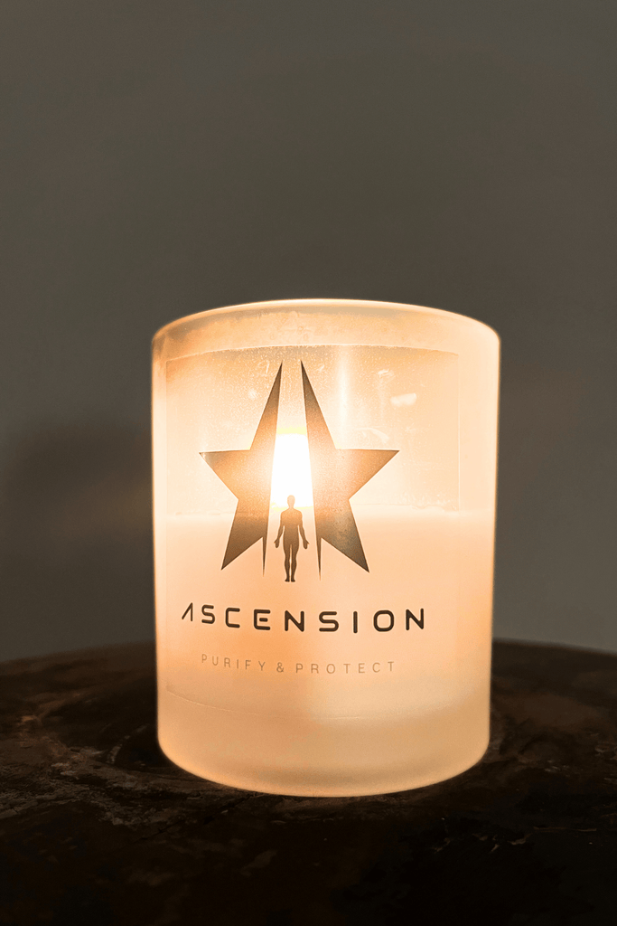 A Galactic Federation of Light ASCENSION Candle in a glass jar, exuding an ambiance of calmness, with the word "ascension" and a graphic of a human figure within a star.