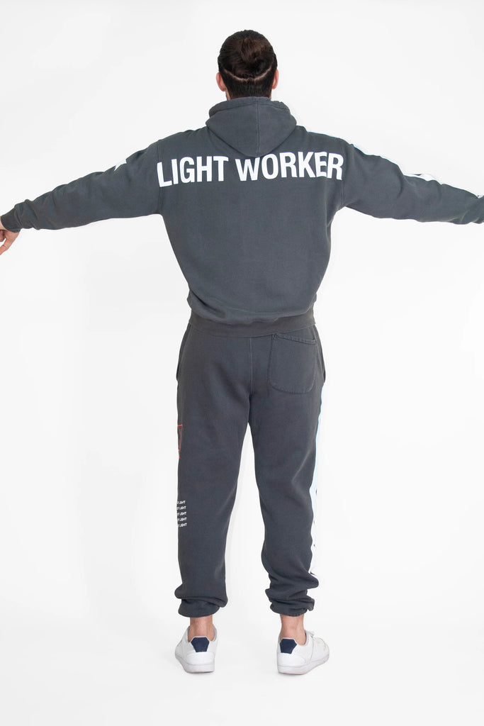 GFLApparel's LIGHT WORKER HOODIE IN SPACE GLOW.