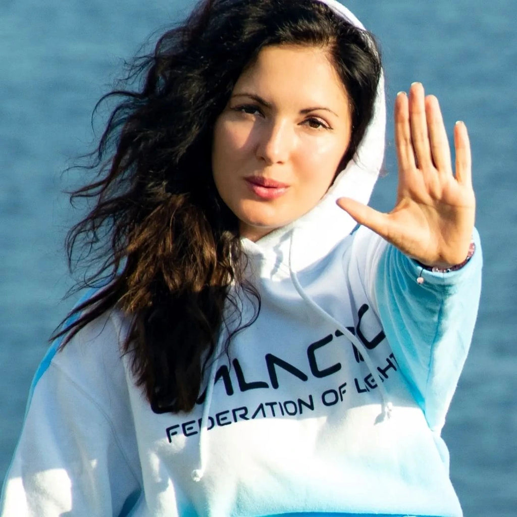 Livia Devi provides healing in a branded GFL hoodie